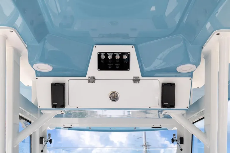  Yacht Photos Pics 2026 Sea Fox 288 Commander boat interior, featuring blue ceiling and control panel.