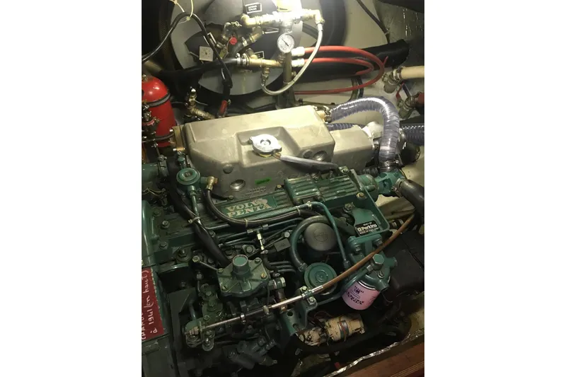  Yacht Photos Pics Engine compartment of a 1990 Hallberg-Rassy 36 sailboat with Volvo Penta engine.