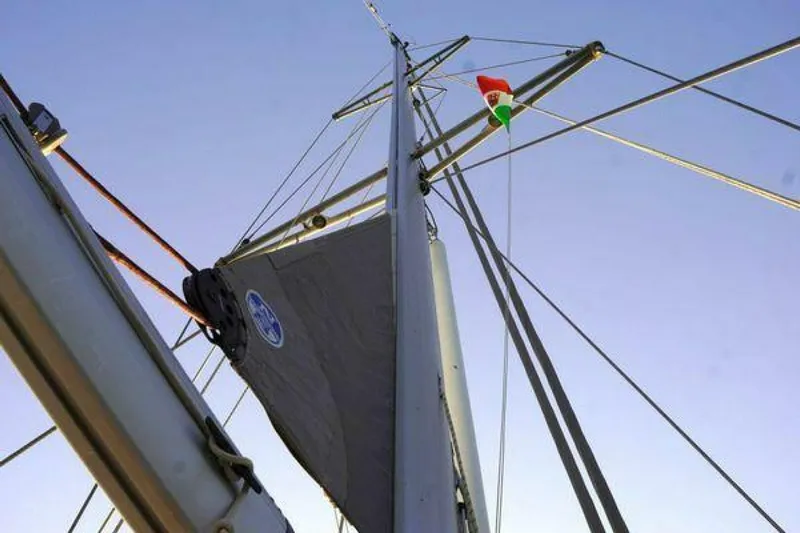 Persistence Yacht Photos Pics Hallberg-Rassy 53 sailboat mast and rigging against clear sky, 2002 model.