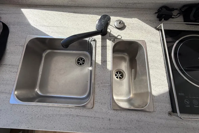  Yacht Photos Pics Stainless steel double sink and faucet in Schionning 1850 S, 2023 model.