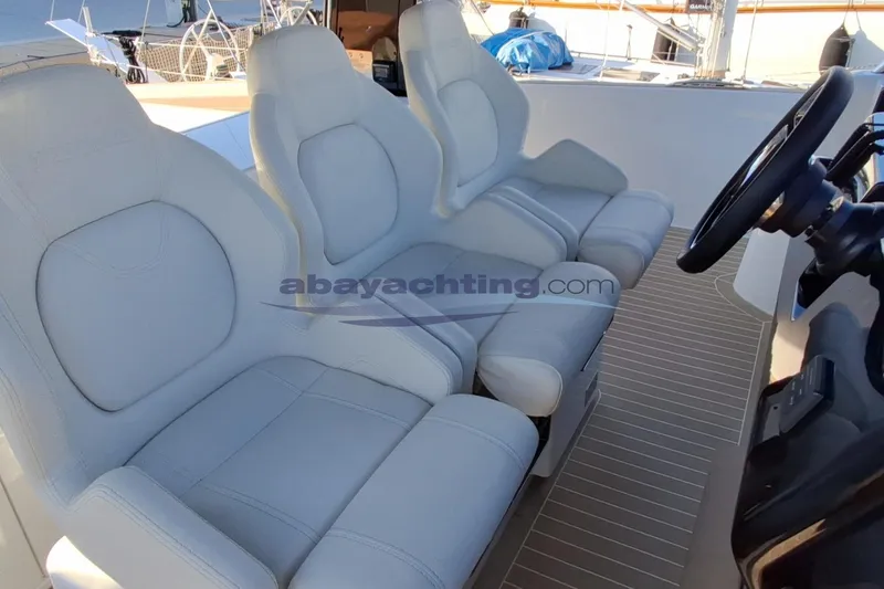  Yacht Photos Pics Luxury seating on 2025 Solaris Power 52 Open yacht with modern helm.