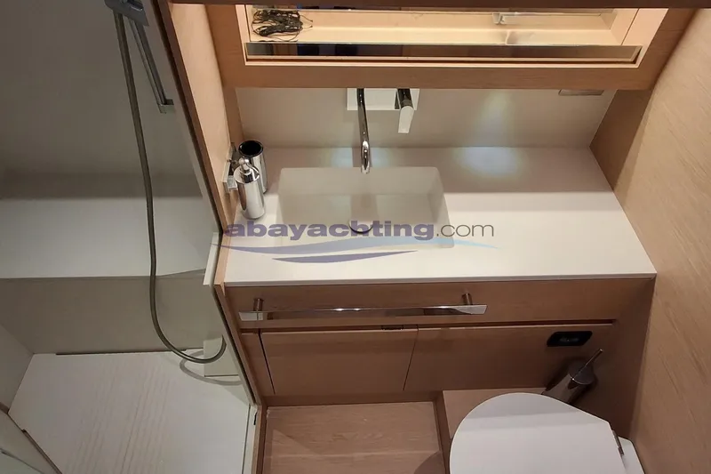  Yacht Photos Pics Modern bathroom interior of 2025 Solaris Power 52 Open yacht, featuring sleek sink and shower.