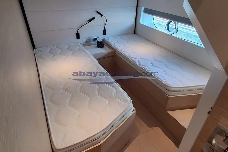  Yacht Photos Pics 2025 Solaris Power 52 Open yacht cabin with twin beds and modern design.