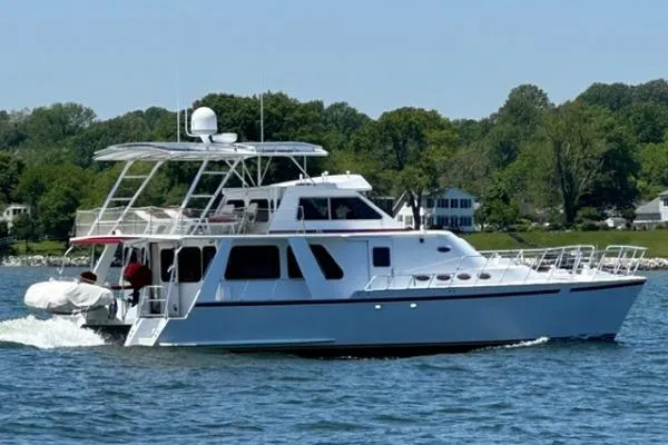 Island Hopper Yacht Photos Pics 2001 Crosswater Passagemaker 49 yacht cruising on a scenic lake.