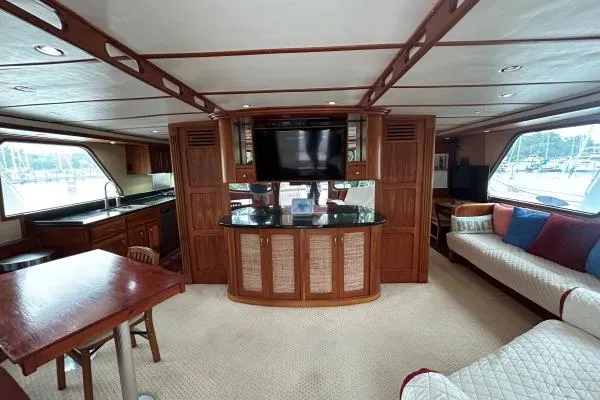 Island Hopper Yacht Photos Pics Luxurious interior of 2001 Crosswater Passagemaker 49 yacht with wood finishes and modern amenities.