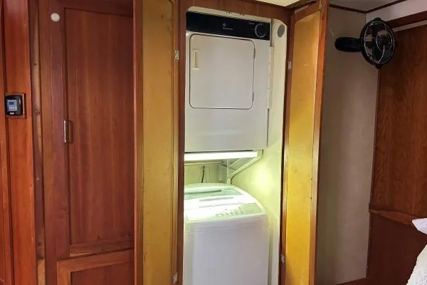 Island Hopper Yacht Photos Pics Stacked washer and dryer in 2001 Crosswater Passagemaker 49 boat interior.