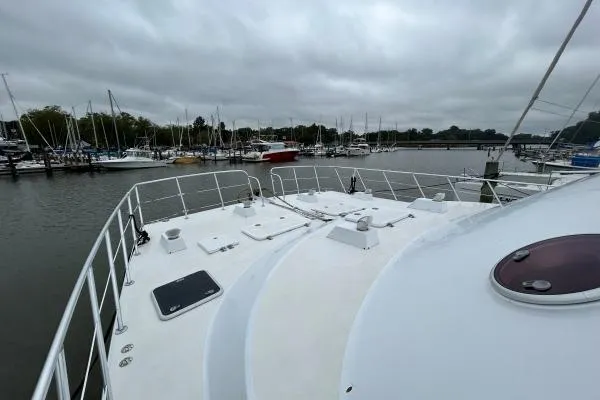Island Hopper Yacht Photos Pics Bow view of 2001 Crosswater Passagemaker 49 yacht docked at marina.