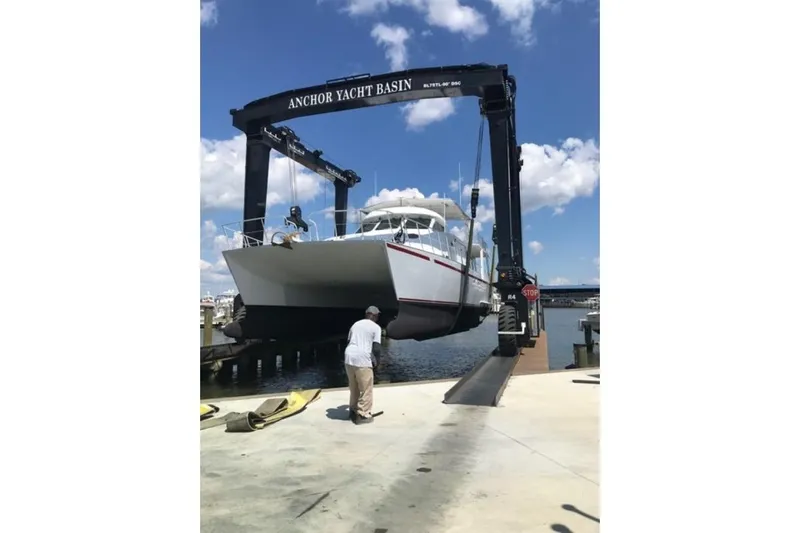Island Hopper Yacht Photos Pics Crosswater Passagemaker 49 yacht being lifted at Anchor Yacht Basin, 2001 model.