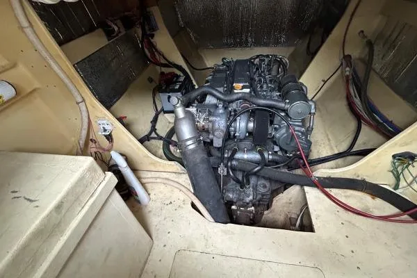 Island Hopper Yacht Photos Pics Engine room of 2001 Crosswater Passagemaker 49, showcasing marine engine and wiring.