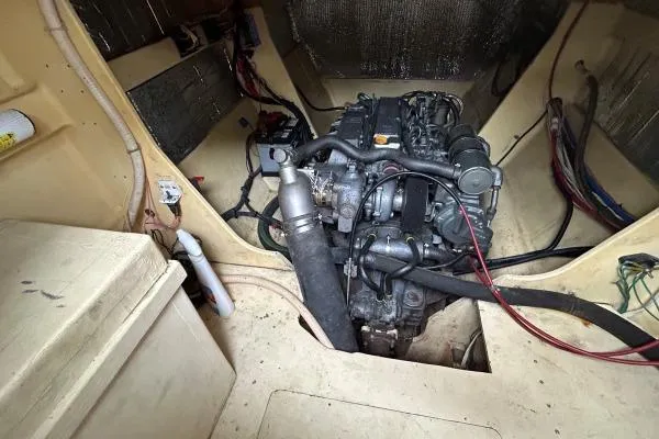 Island Hopper Yacht Photos Pics Engine compartment of 2001 Crosswater Passagemaker 49 boat, showcasing mechanical components.