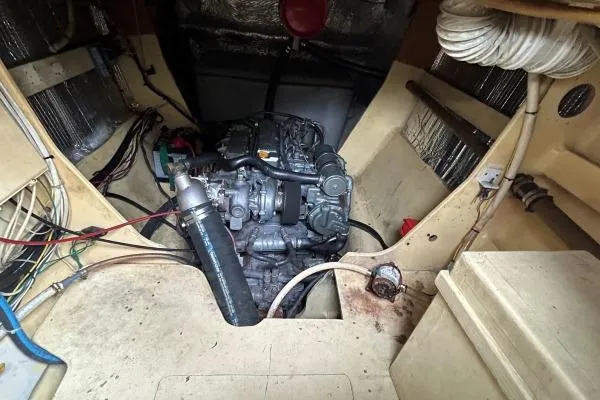 Island Hopper Yacht Photos Pics Engine compartment of 2001 Crosswater Passagemaker 49 boat, showcasing mechanical components.