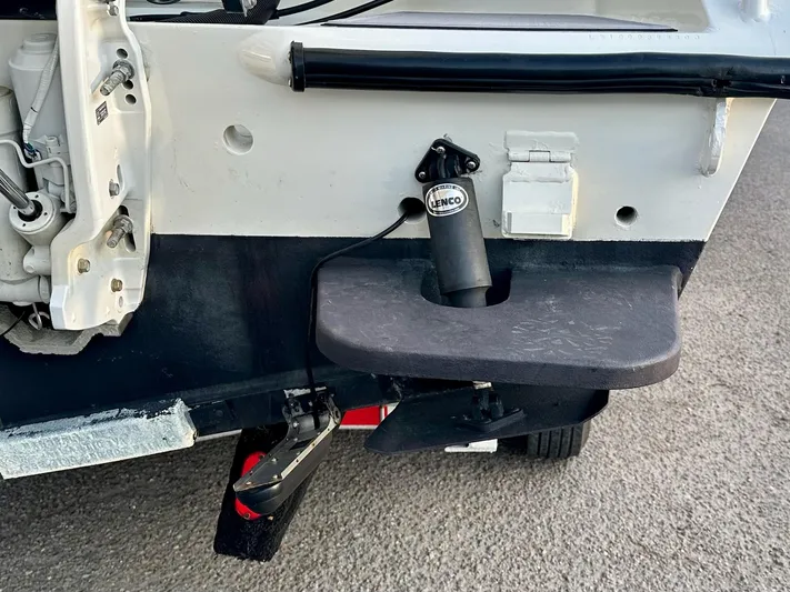  Yacht Photos Pics 2003 Custom Leblanc CC boat transom with Lenco trim tab actuator.