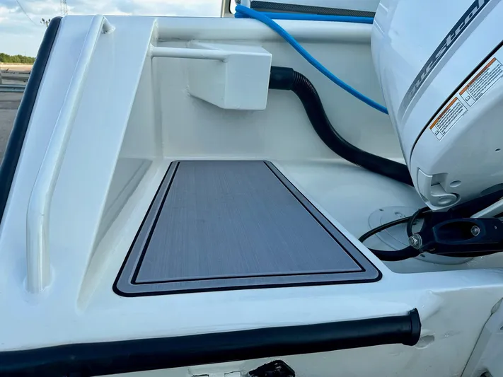  Yacht Photos Pics Custom 2003 Leblanc CC boat deck with motor and non-slip mat.