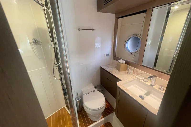 Azimut 66 Magellano Yacht Photos Pics Luxurious bathroom in 2024 Azimut Magellano 66 yacht with modern fixtures and elegant design.