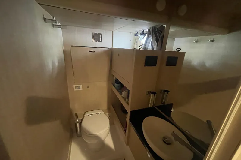 Azimut 66 Magellano Yacht Photos Pics Bathroom interior of 2024 Azimut Magellano 66 yacht, featuring modern fixtures and compact design.