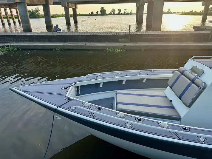  Yacht Photos Pics Custom 2003 Leblanc CC boat docked by a serene river at sunset.