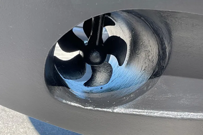 Long Gone Yacht Photos Pics Close-up of a 2013 Carver C34 boat propeller in a tunnel thruster.