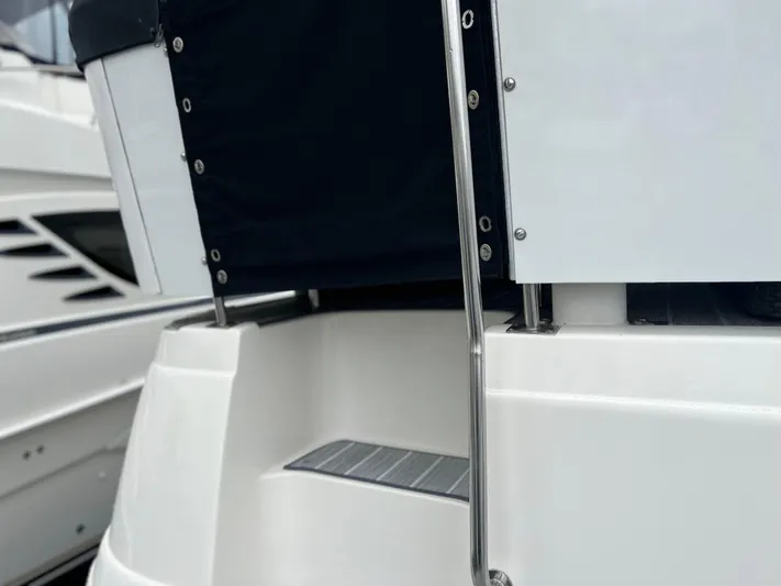 Low Engine Hours Yacht Photos Pics 1995 Cruisers Yachts 3650 ACMY, rear deck view with stainless steel railing.