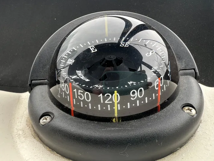 Low Engine Hours Yacht Photos Pics Compass on 1995 Cruisers Yachts 3650 ACMY, showing cardinal directions and degrees.