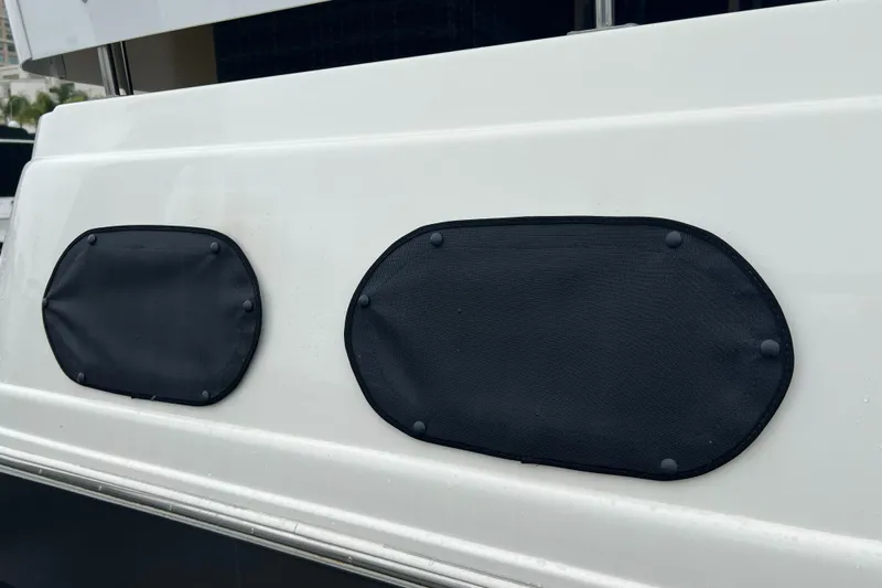 Low Engine Hours Yacht Photos Pics 1995 Cruisers Yachts 3650 ACMY boat with black oval window covers.