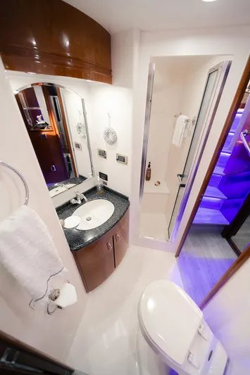 Spencer Yacht Photos Pics Luxurious bathroom in 2003 Carver Voyager yacht with modern fixtures and elegant design.