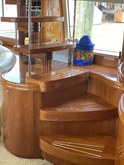 85 Azimut Ultimate Yacht Photos Pics Interior of 1999 Azimut 85 Ultimate yacht with elegant wooden staircase design.