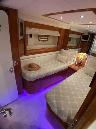 85 Azimut Ultimate Yacht Photos Pics Interior of 1999 Azimut 85 Ultimate yacht with twin beds and ambient lighting.