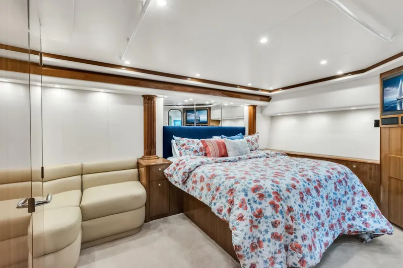 Berry Blessed Yacht Photos Pics Luxurious bedroom interior of 2005 Viking 74' Enclosed Bridge yacht with floral bedding.