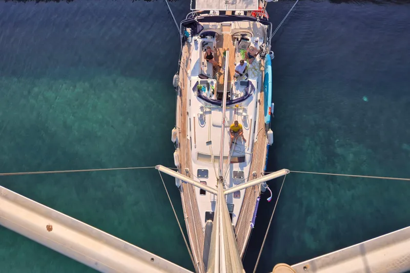 Pac Man Yacht Photos Pics Aerial view of 2001 Beneteau Oceanis Clipper 473 yacht on clear water.