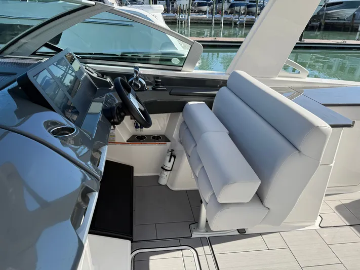 Sea Breeze Yacht Photos Pics Interior of 2022 Aviara AV32 OB with helm and seating.