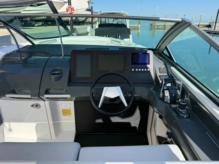 Sea Breeze Yacht Photos Pics 2022 Aviara AV32 OB cockpit with modern controls.