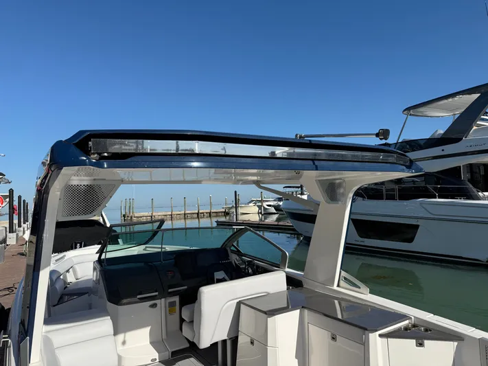 Sea Breeze Yacht Photos Pics 2022 Aviara AV32 OB boat docked under clear blue sky.