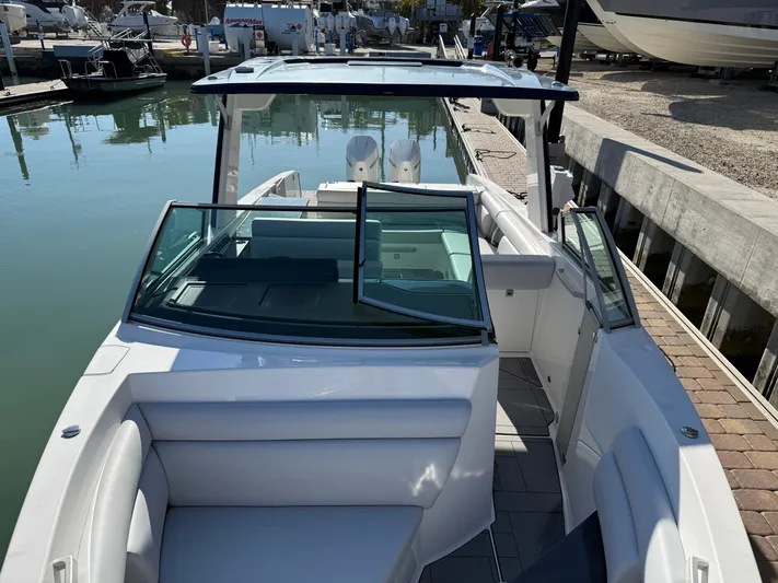 Sea Breeze Yacht Photos Pics 2022 Aviara AV32 OB boat docked, modern design.