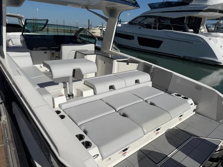 Sea Breeze Yacht Photos Pics Luxurious Aviara AV32 OB boat, 2022, with sleek interior at the marina.