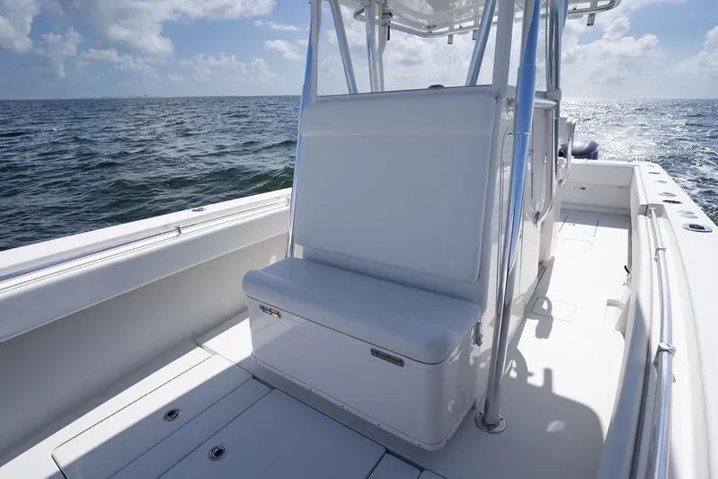  Yacht Photos Pics 2013 Contender 32 ST boat interior with seating, ocean view, and clear skies.