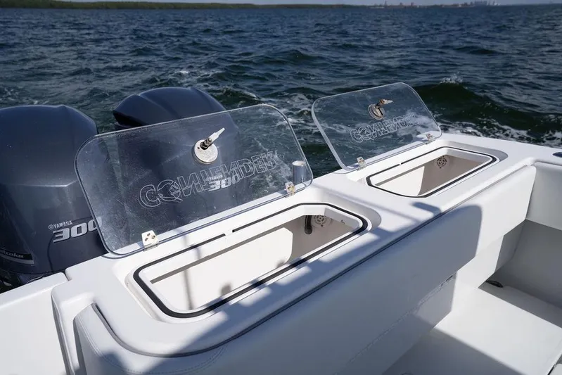  Yacht Photos Pics 2013 Contender 32 ST boat with Yamaha 300 engines on open water.