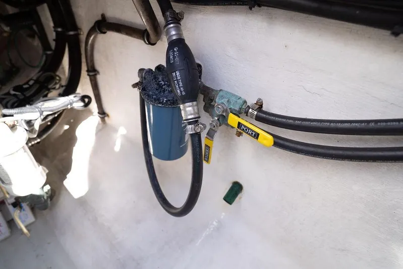  Yacht Photos Pics Engine compartment of 2013 Contender 32 ST with fuel lines and filter system.