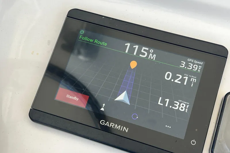  Yacht Photos Pics Garmin GPS display on 2013 Contender 32 ST boat showing navigation route.