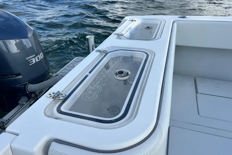  Yacht Photos Pics 2013 Contender 32 ST boat with Yamaha 300 engine on water.