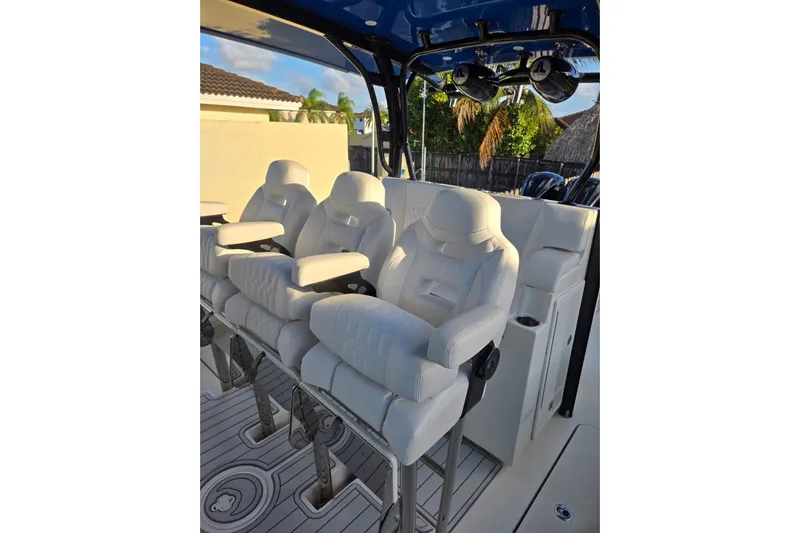  Yacht Photos Pics Luxurious white seating on 2017 HCB 42 Siesta boat, featuring modern design and comfort.