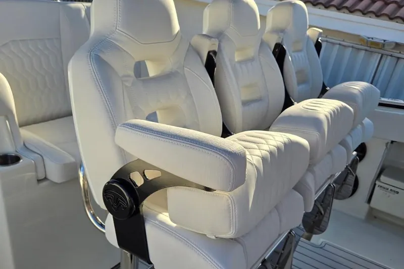  Yacht Photos Pics Luxurious white seating on 2017 HCB 42 Siesta boat, featuring modern design and comfort.