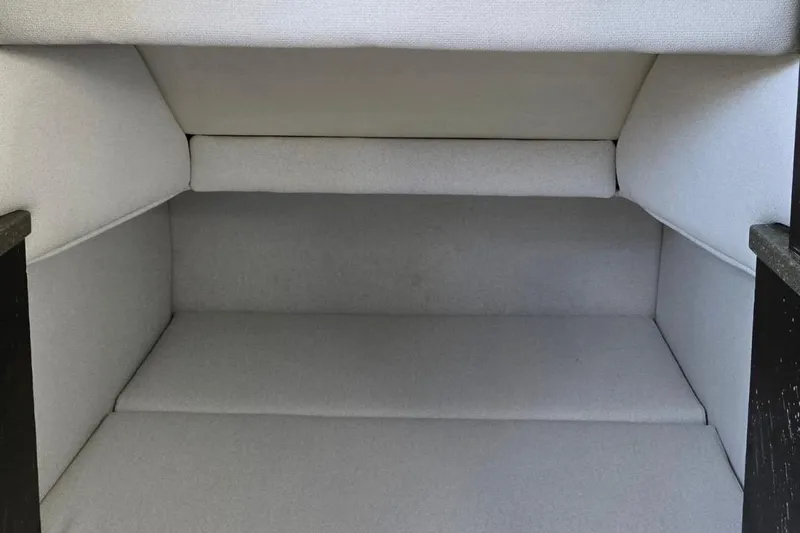  Yacht Photos Pics Interior cabin of 2017 HCB 42 Siesta boat, featuring cushioned seating.