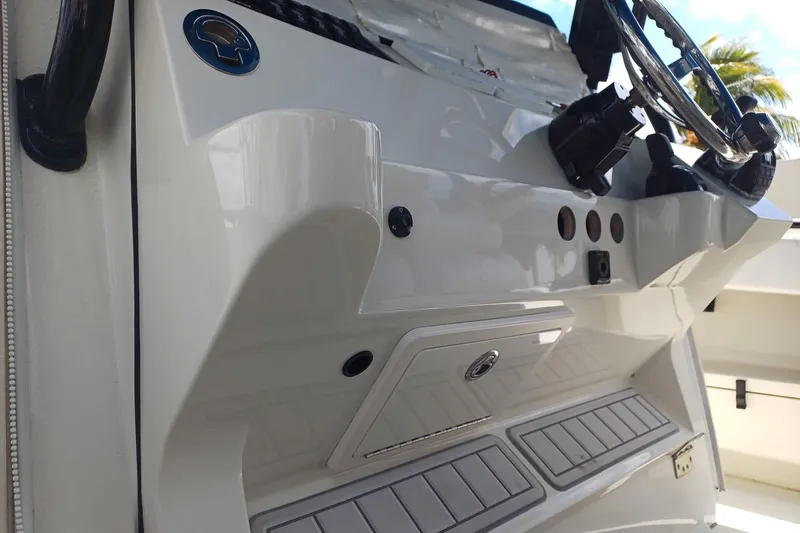  Yacht Photos Pics 2017 Hydra-Sports 4200 Siesta boat dashboard with steering wheel and controls.