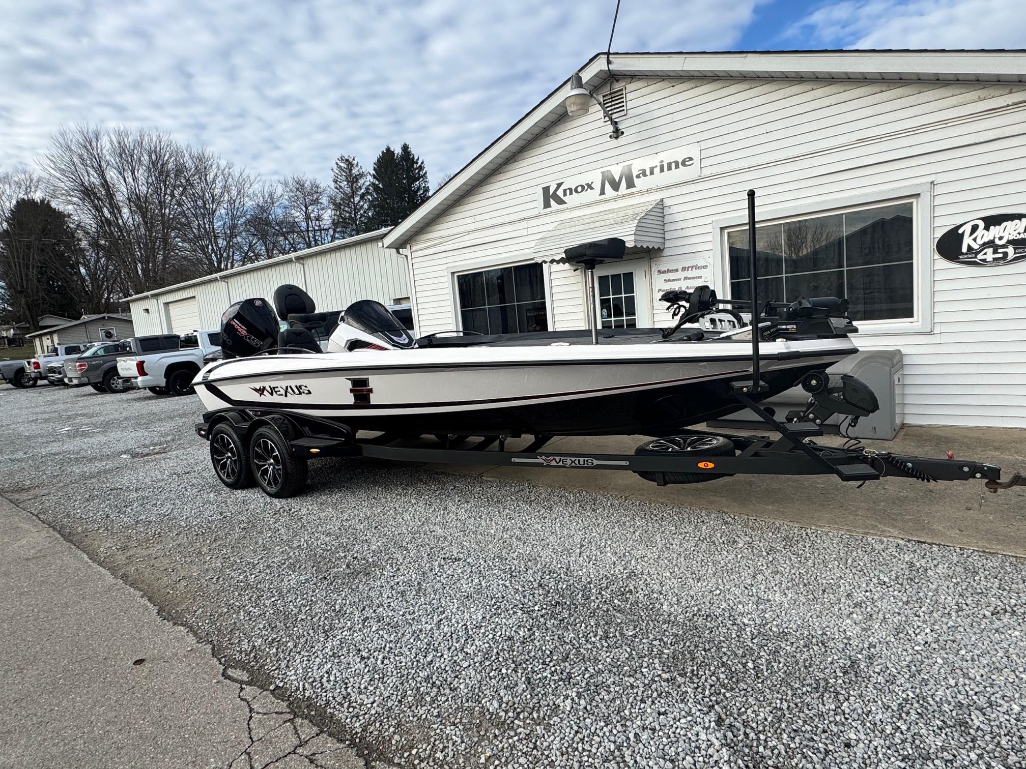 2025 Vexus VXS21 boat parked outside Knox Marine dealership.