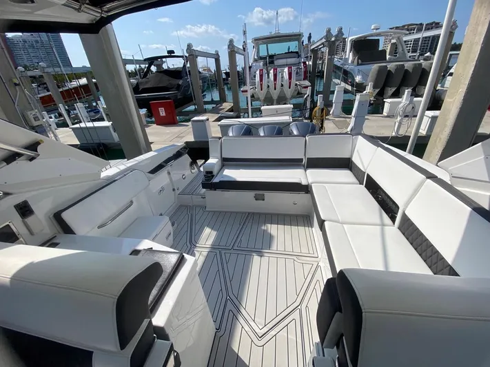  Yacht Photos Pics Luxurious 2018 Monterey 385 SE boat interior with spacious seating at marina.