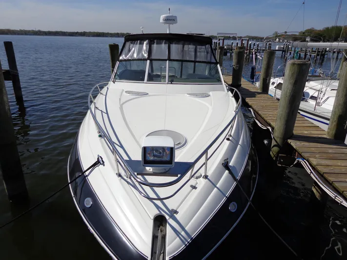  Yacht Photos Pics 2008 Cruisers Yachts 330 Express docked at a marina, front view.