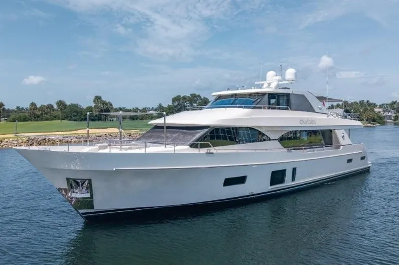 Chindon Yacht Photos Pics Luxurious 2017 Ocean Alexander motor yacht cruising on a serene waterway.