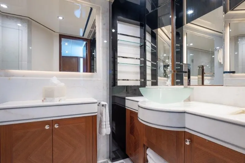 Chindon Yacht Photos Pics Luxurious bathroom interior of 2017 Ocean Alexander Motor Yacht with modern fixtures and elegant design.