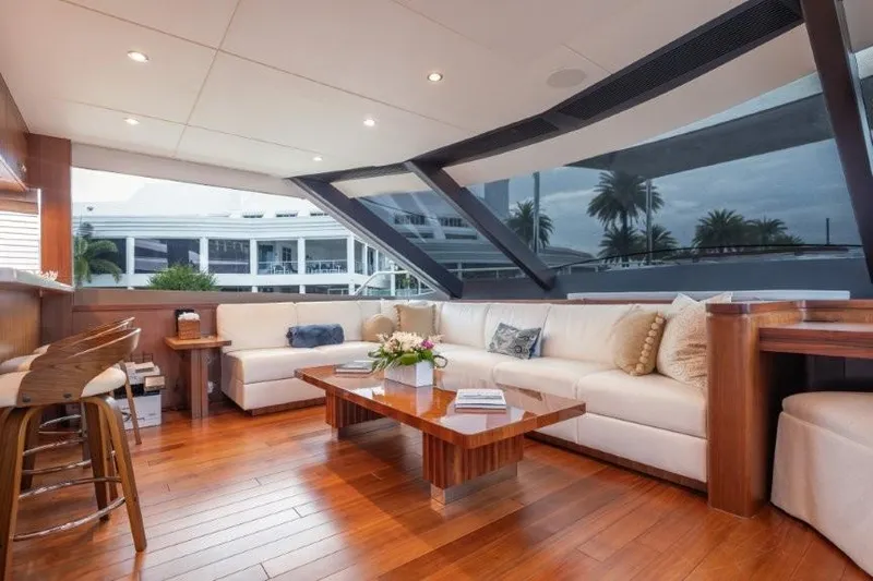 Chindon Yacht Photos Pics Luxurious interior of 2017 Ocean Alexander Motor Yacht with elegant seating and wooden flooring.