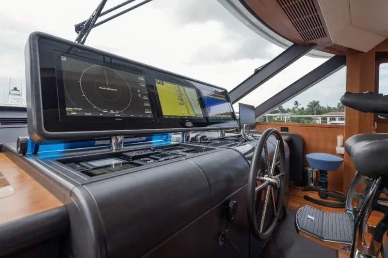 Chindon Yacht Photos Pics 2017 Ocean Alexander Motor Yacht helm with advanced navigation displays and steering wheel.